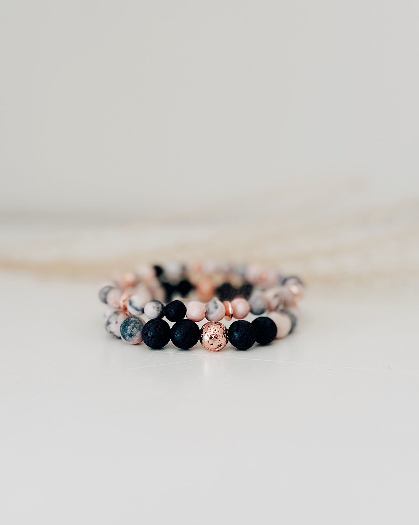 Pink Zebra Gemstone + Black Lava Bracelet Set